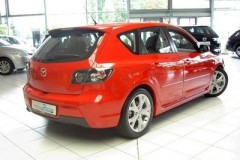 Red Mazda 3 2006 hatchback back, side