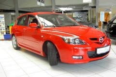 Red Mazda 3 2006 hatchback front